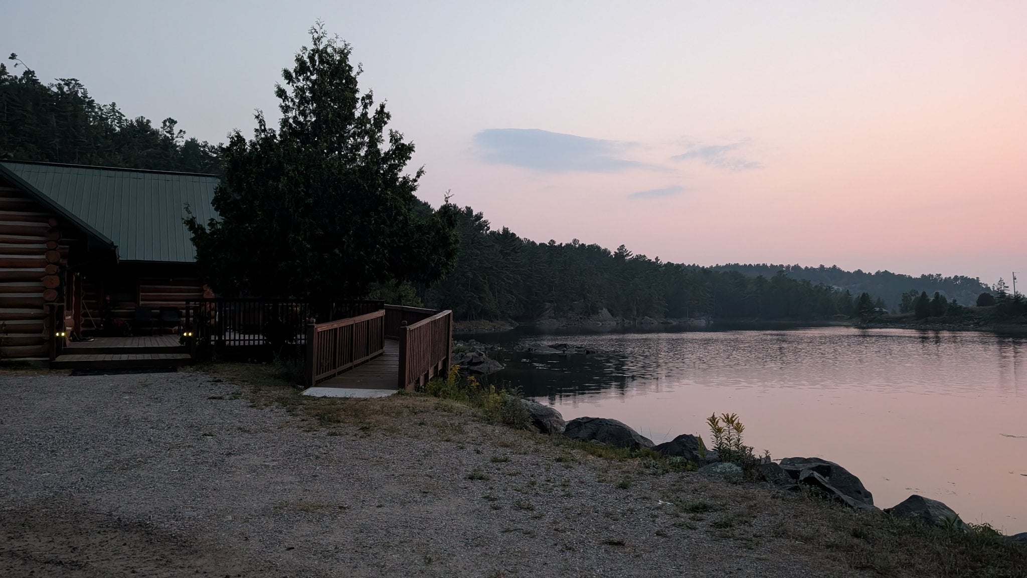 Rainbow Lodge at dusk — waterfront serenity on the Whitefish River
